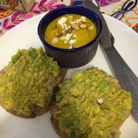 Avocado hummus toast  at Travel Yoga Cafe in New Delhi