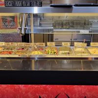 Falafel sandwiche toppings bar at Amsterdam Falafelshop in Miami