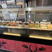 Selection of toppings   at Amsterdam Falafelshop in Miami