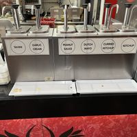 Sauces, tahini, peanut sauce., curry ketchup and ketchup are all vegan  at Amsterdam Falafelshop in Miami