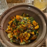 Chickpea tangine with millet and aubergine at Local in Lisbon