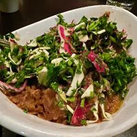 Mujaddara (puréed lentils with caramelized onions and rice, topped with cabbage salad)   at Phoenician Taverna in Mason