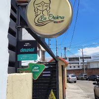 sign outside the business at La Chakra  in Cuenca