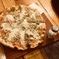 This pizza is huge!!!  at Pizzeria Amici Miei La Floresta in Quito