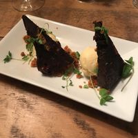 Chocolate and honeycomb parfait with blood orange sorbet, fully vegan dessert at The Rose & Crown Bistro in Northampton