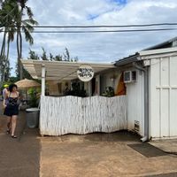 The restaurant is tucked back around the left from the main driveway at Raised by the Waves  in Kahuku
