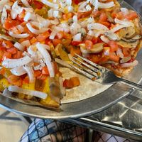 I get that this is in a fairly rural part of CT, a place already sorely lacking in vegan options. But my god. Frozen daiya pizza, microwaved, served on the cardboard.  at Longshots Sports Cafe in Montville