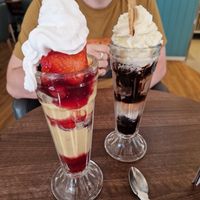 Vegan knickerbocker glory (left) and non-vegan chockabocker sundae (right) at Cadwaladers in Porthmadog