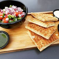 vegan toasts with salad at Cafe Cafe in Haifa