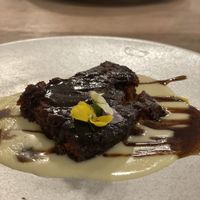 Sticky toffee pudding with custard  at Stem & Glory in London