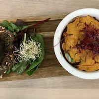 Lasagne with greens, seed crackers and dip at Stem & Glory in London