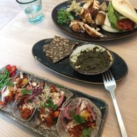 Jackfruit bao, Jackfruit taco, seed cracker and nori tapenade at Stem & Glory in London