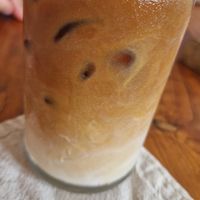 Iced latte with oatmilk at Kenza in 