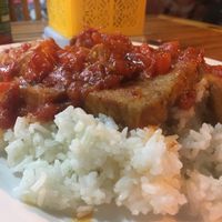 The tofu with tomato didn't stand out against that served at other restaurants but was the best vegan entree we tried at Happy Platters. at Happy Platters in Dong Hoi