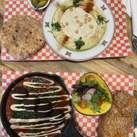 Hummus Tahini Plate and Plant Based Shakshuka   at Cafe Landwer - University Ave in Toronto