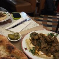 Hummus with soy strips and focaccia  at Cafe Landwer - University Ave in Toronto