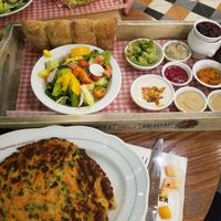 Vegan breakfast plate. Vegan omlette, yogurt and jam, bread, and a ton of spreads! at Cafe Landwer - University Ave in Toronto