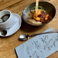 Sea buckthorn cream and an americano  at Rataskaevu 16 in Tallinn