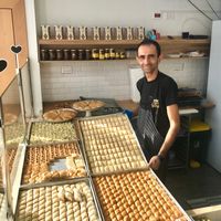 The owner with his Delicious Vegan pastries😄 at Malek Sweets in Tel Aviv