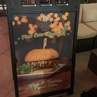 Large sign on the street welcoming people who want plants to eat 😎 at Batch in West Palm Beach