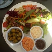 Deli selection with garlic olives, red pepper and basil pâté & carrot and cashew pâté at The Green Way Cafe in Matlock