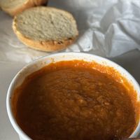 Tomato Bisque with onion-herb roll + vegan butter     at Wildflower Cafe and Bakery in Arcata
