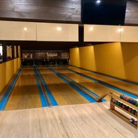 Bowling area next to dining area at Bolos Kitchen in Brunswick