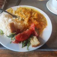 Sweet potato and chickpea curry and tomato and crouton salad. at Foyles Bookshop Cafe in London