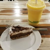 Chocolate cheesecake & Mango smoothie. at Munch in Palmerston North