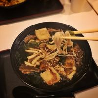 Several types of mushrooms, fried tofu and wakame seaweed in a broth filled with lovely mushroom flavour. at Healthy Soba IKI in Central Singapore