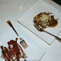 Caramel Fudge Cheesecake, Raspberry Swirl Cheesecake  at Community Restaurant in Oakville