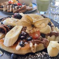 The ground cherry on top of this waffle was pretty and delicious! Beautiful presentation at Community Restaurant in Oakville