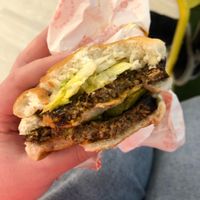 Double mb with cheeze - half eaten haha  at Miami Burger Test Kitchen in Reading