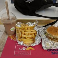 Double Louisiana Chick'n Burger, Large Fries with Peri Peri salt and a regular chocolate shake with peanut butter. at Miami Burger Test Kitchen in Reading