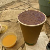ginger shot and a bleu smoothie   at Aguacate in Miami