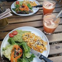 Avodado Toast with scrumbled tofu, salad and fresh orange juice at Cabane  in Lisbon