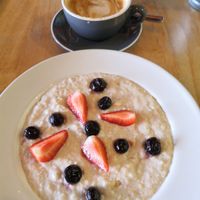 Oatmeal and vegan latte at The Mossy Forest Cafe in Tanah Rata