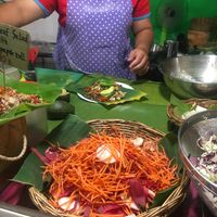 Preparing the salad at Kwenski's - Food Stall in Pai