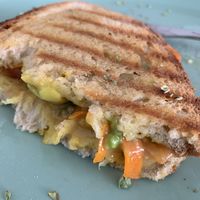 Vegan cheese, avocado, tomato, carrot and mustard toasty.  at Veg & Tal in Sines