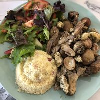 Couscous with mushrooms, tofu and chestnuts. So good! at Veg & Tal in Sines