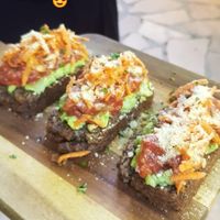 Quinoa bread, avocado, tomato, carrot. Amazing! at Coco Calala in Leon