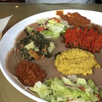 Vegetarian combo for 2. I crossed out the lamb dish that the person I was with ordered. The red lentils, salad, and cabbage were my fav    at Queen of Sheba in Louisville