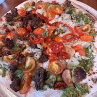 Tomato Tamahto with half impossible meat.   at Hand Fire Pizza in Jackson