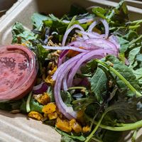 Baby Kale salad with cherry tarragon dressing at Hand Fire Pizza in Jackson
