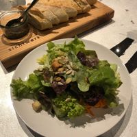 Salad and olives tapenade with baguette at Sichtwerk in Eimeldingen