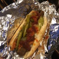 Veggie Dog topped with pickles, onion, hots, jalapeños,& sport peppers. (if you haven’t tried sport peppers you are missing out!) sorry for the low quality i was at work lol at Pip's Dock Street Dogs in Annapolis