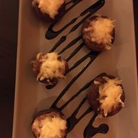 Mushrooms fillled with cheese and bacon at Kong - Food Made With Compassion in Lisbon