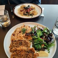 Tomato rice with fried fish at Kong - Food Made With Compassion in Lisbon