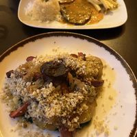 Inktvis onder en steak boven  at Kong - Food Made With Compassion in Lisbon