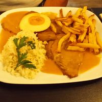 Seitan steak with mustard sauce, "egg", rice and fried at Kong - Food Made With Compassion in Lisbon